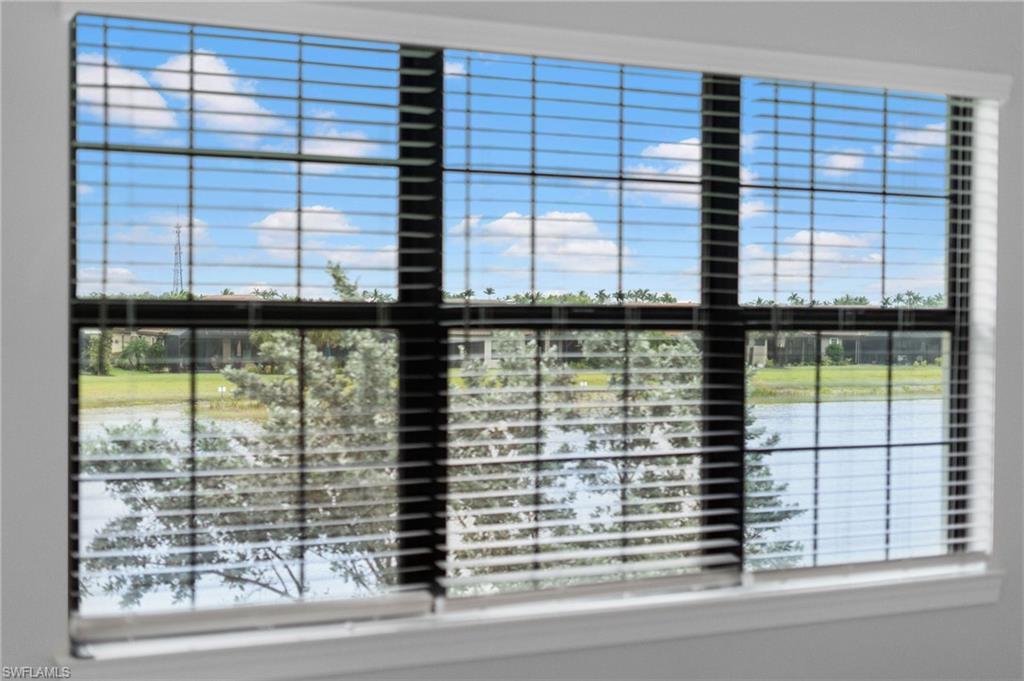 15244 Zeno Way, Unit 201 Naples, FL 34114 - Photo 46 of 48 a view of a balcony and a window