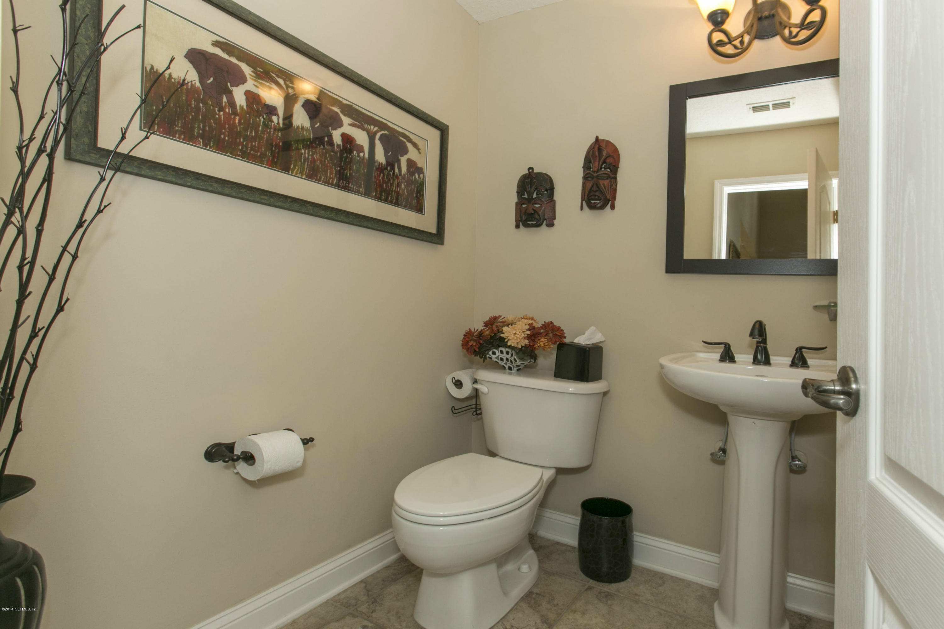 1326 Powis Road St. Augustine, FL 32095 - Photo 23 of 26 a bathroom with a toilet and a sink