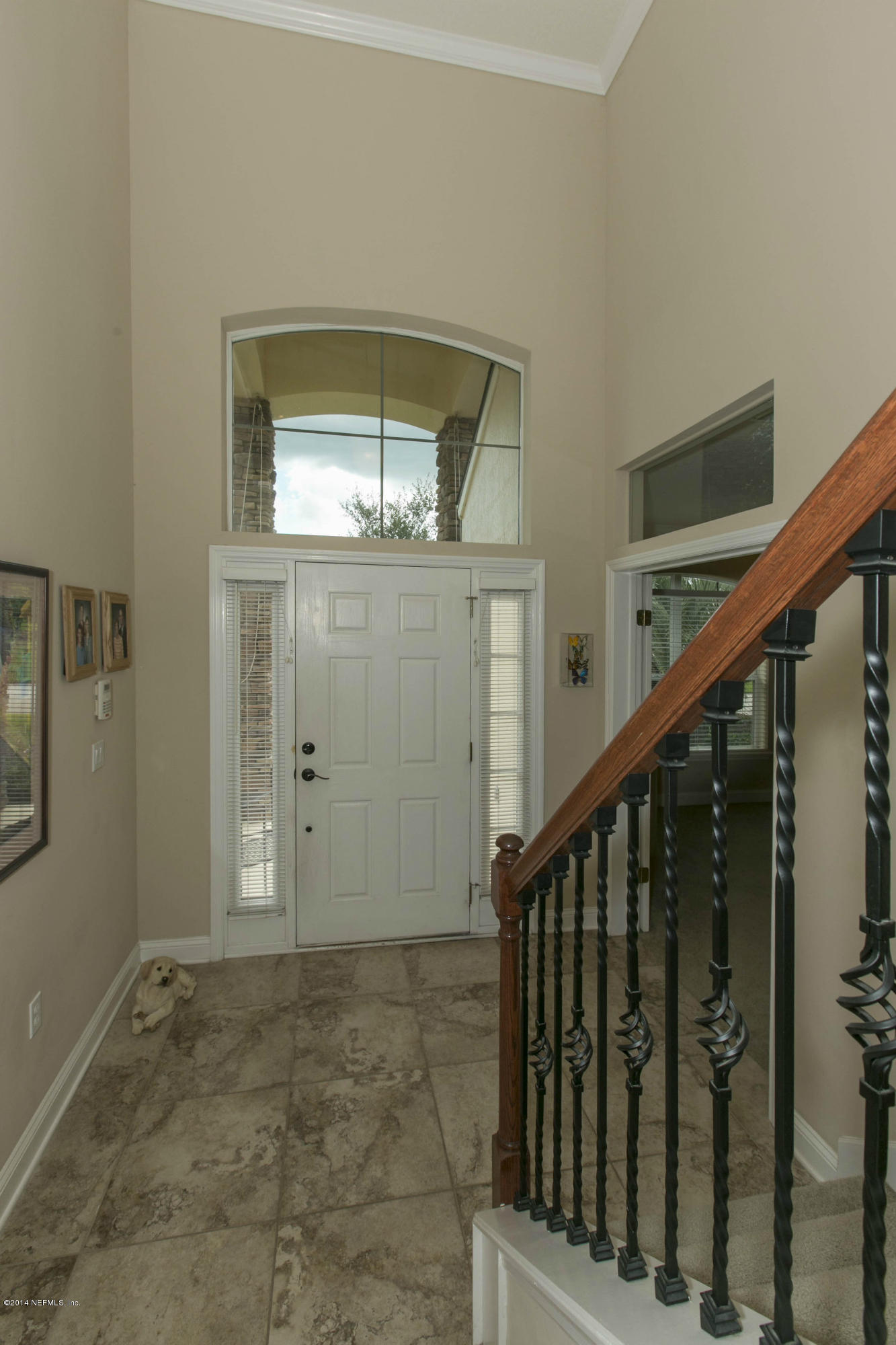 1326 Powis Road St. Augustine, FL 32095 - Photo 3 of 26 a view of staircase with railing and white walls