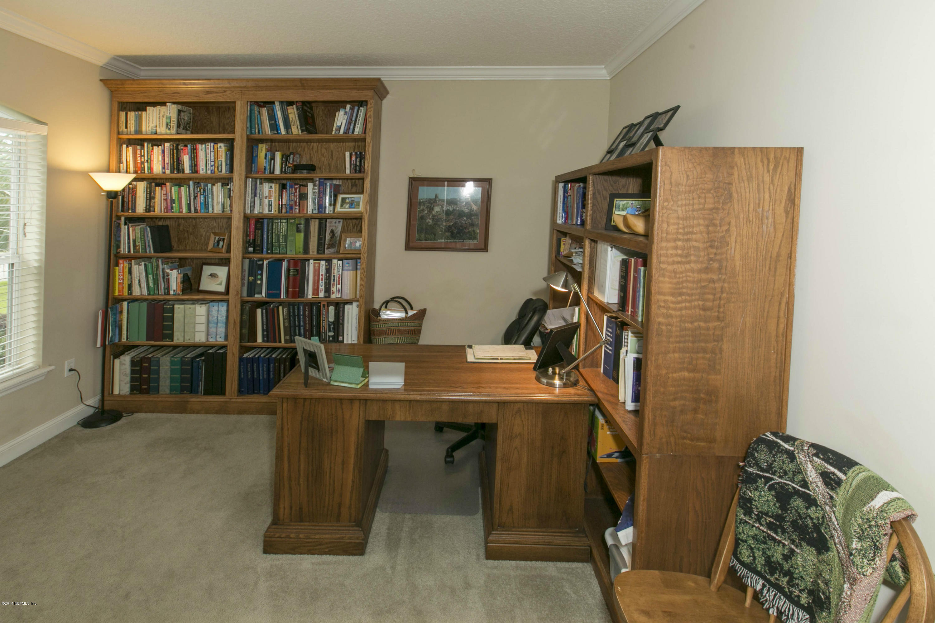 1326 Powis Road St. Augustine, FL 32095 - Photo 5 of 26 a view of a workspace with furniture
