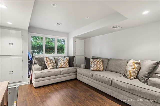 a living room with furniture and a couch