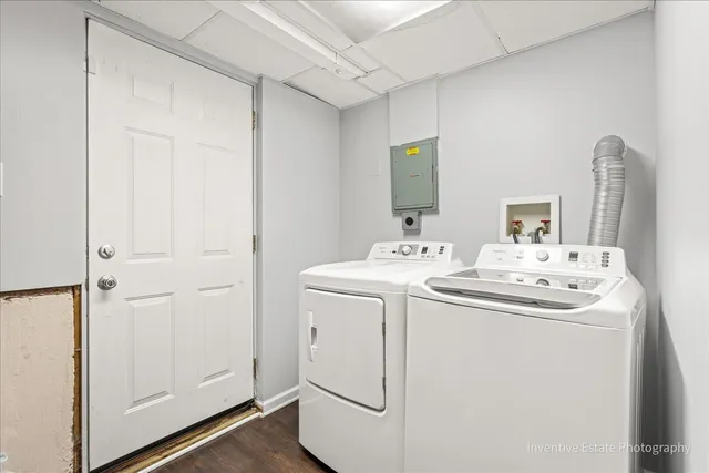 an outdoor space with furniture and wooden floor