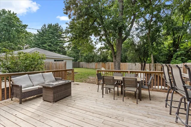 swimming outdoor view with a sitting space