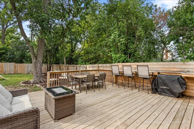 a view of a house with a backyard and a patio
