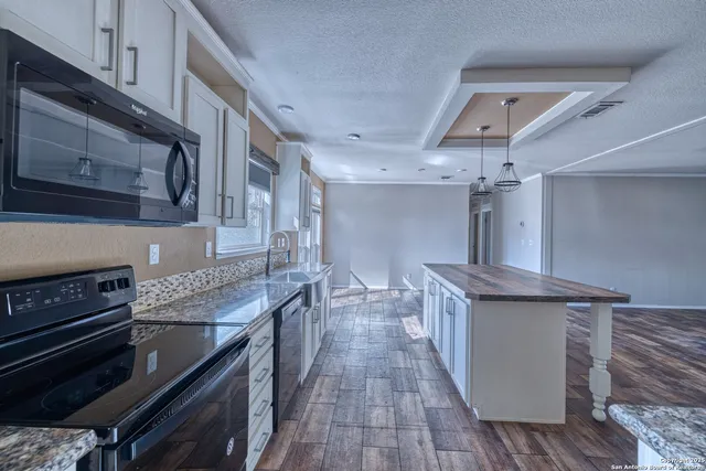 a bedroom with a bed and a view of bathroom