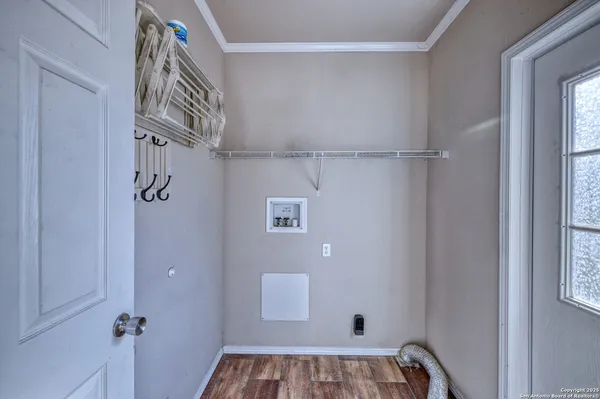 a bathroom with a granite countertop sink mirror vanity and bathtub