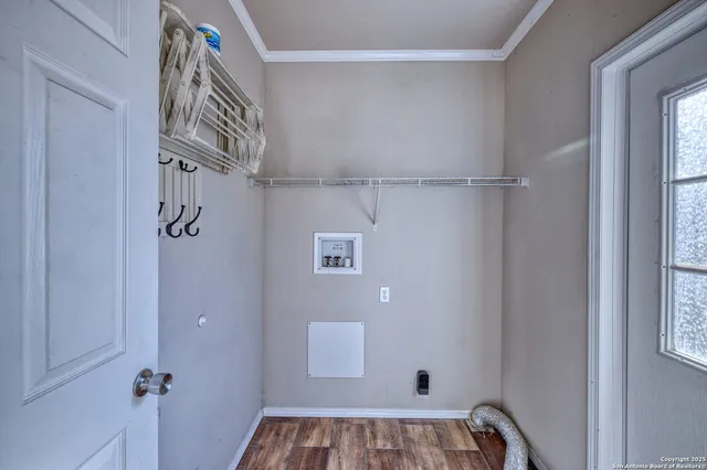 a bathroom with a granite countertop sink mirror vanity and bathtub