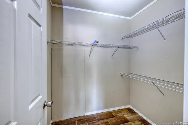 a bathroom with a granite countertop sink mirror and double