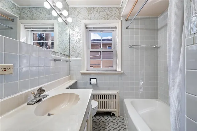 a bathroom with a sink and a bathtub
