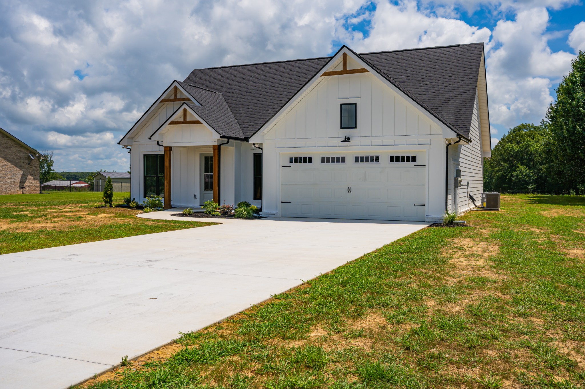 189 Strawberry Ridge Manchester, TN 37355 - Photo 2 of 56 a view of the house with a yard