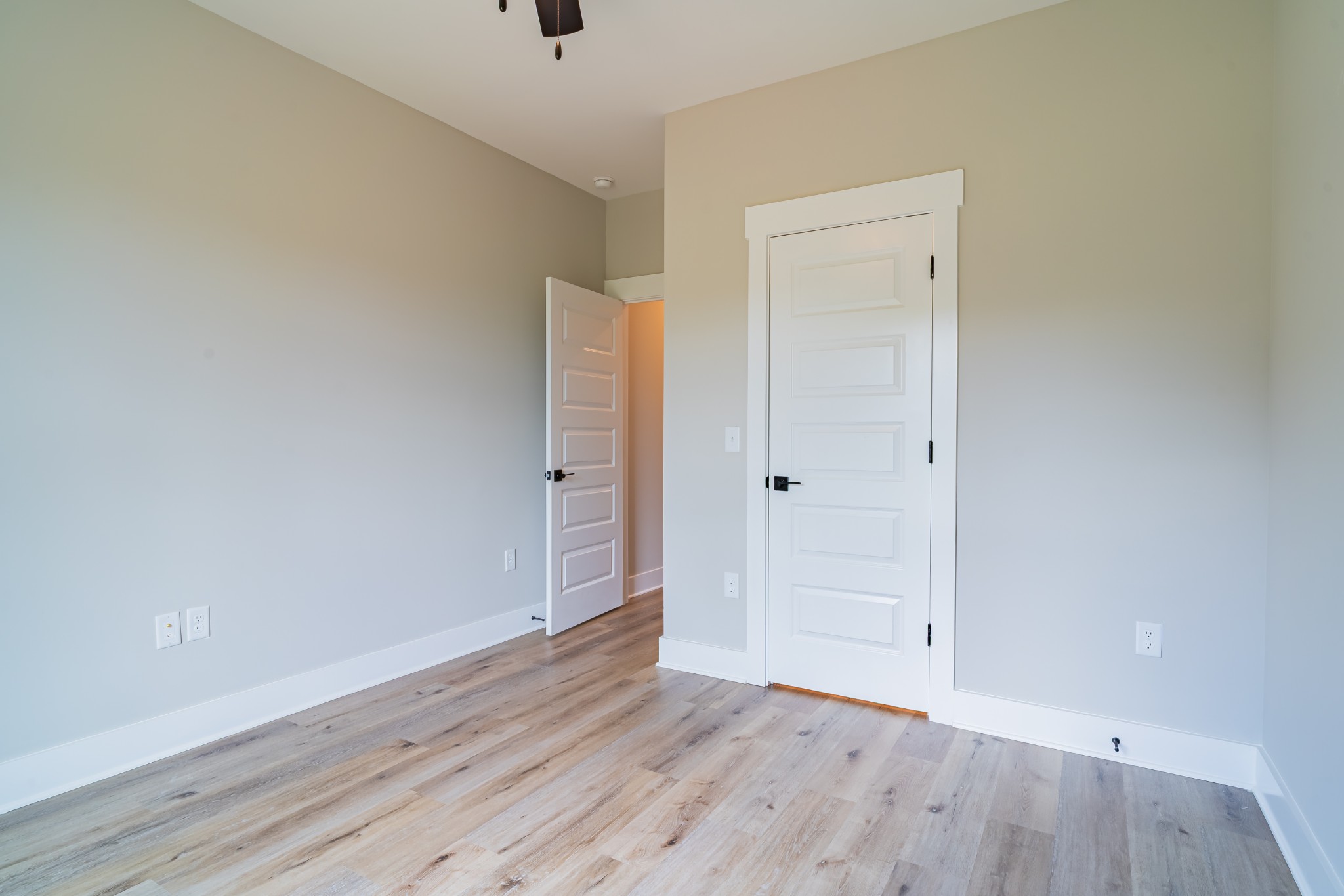 189 Strawberry Ridge Manchester, TN 37355 - Photo 39 of 56 a view of an empty room with wooden floor
