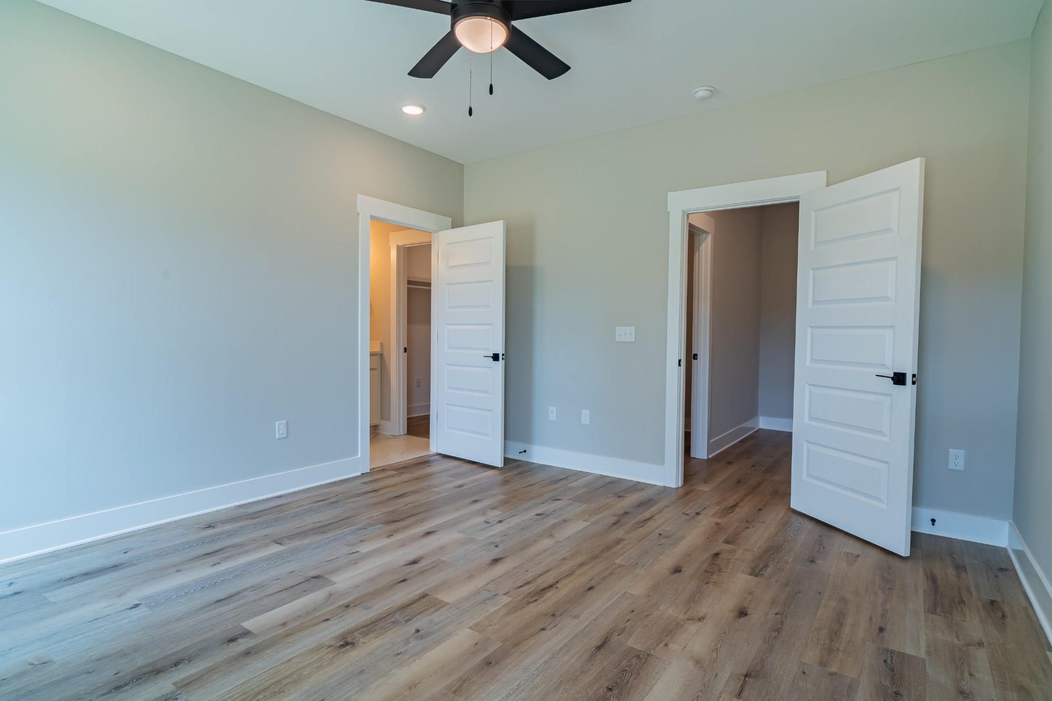 189 Strawberry Ridge Manchester, TN 37355 - Photo 45 of 56 an empty room with wooden floor cabinet and windows