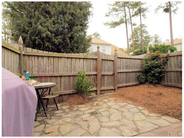 5635 Bridgetowne Way Raleigh, NC 27609 - Photo 15 of 18 a view of a chair and table in the patio