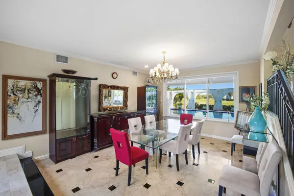 a view of a dining room with furniture