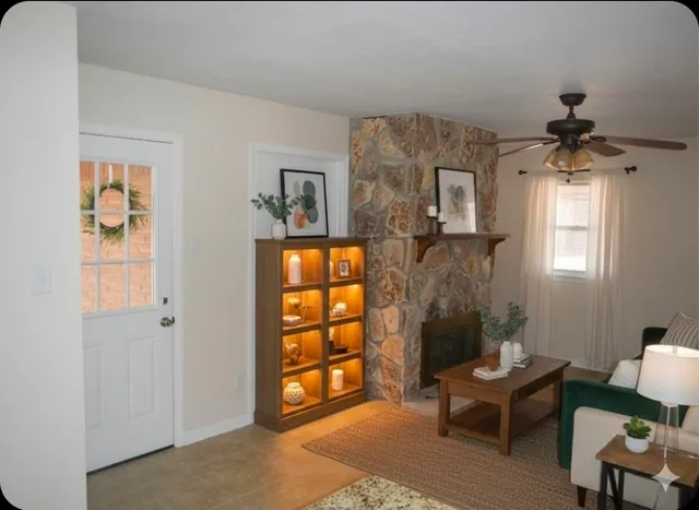 a living room with furniture and a window