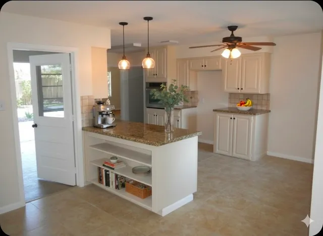 a view of kitchen and kitchen island