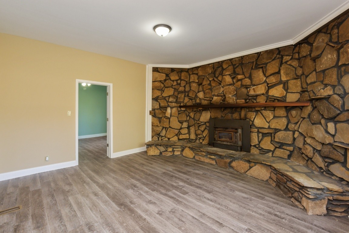 2480 Mann Road Lebanon, TN 37087 - Photo 11 of 35 a view of an empty room with wooden floor and a window