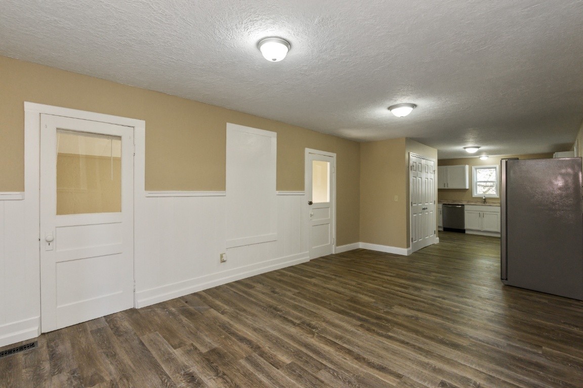 2480 Mann Road Lebanon, TN 37087 - Photo 18 of 35 a view of an empty room with wooden floor and a window