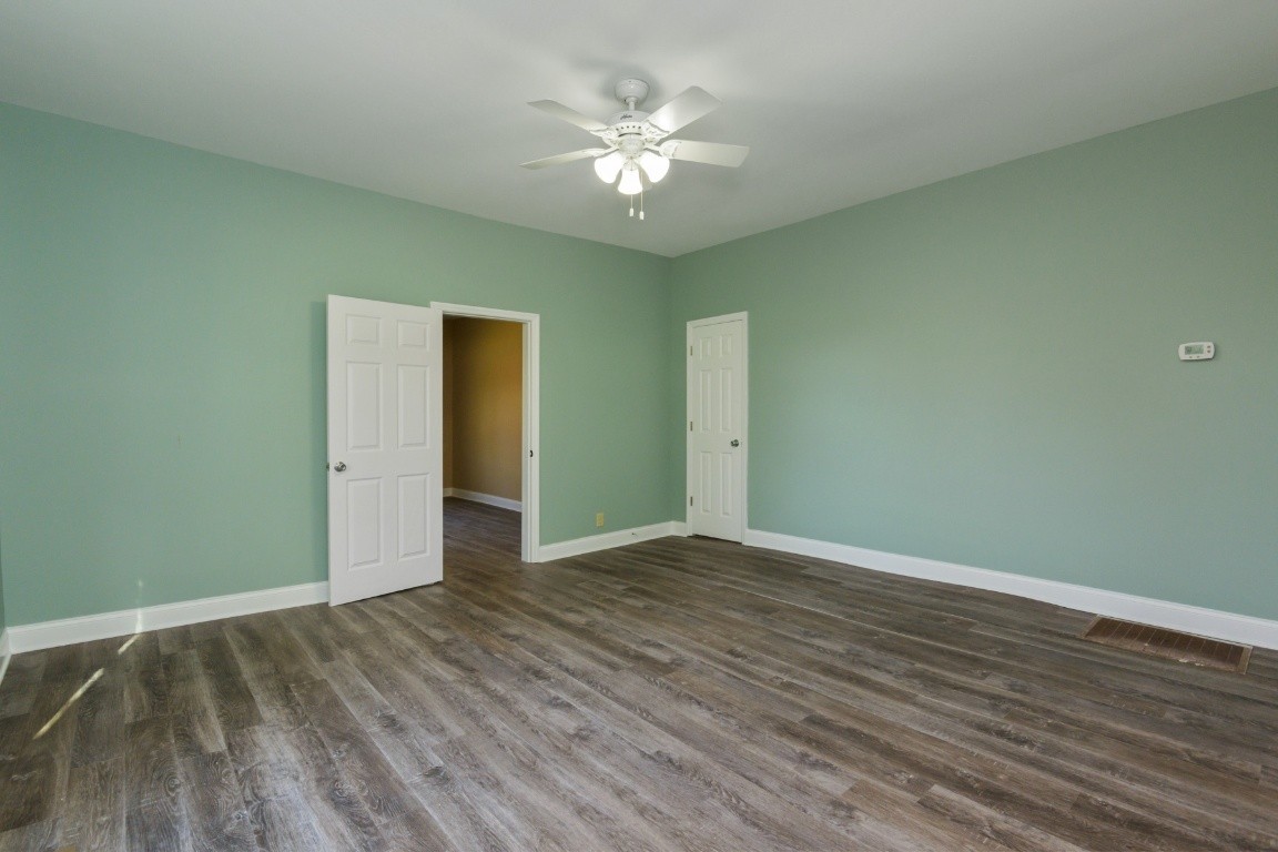2480 Mann Road Lebanon, TN 37087 - Photo 21 of 35 a view of an empty room with wooden floor