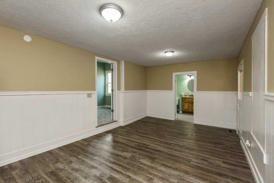 2480 Mann Road Lebanon, TN 37087 - Photo 24 of 35 an empty room with wooden floor and windows