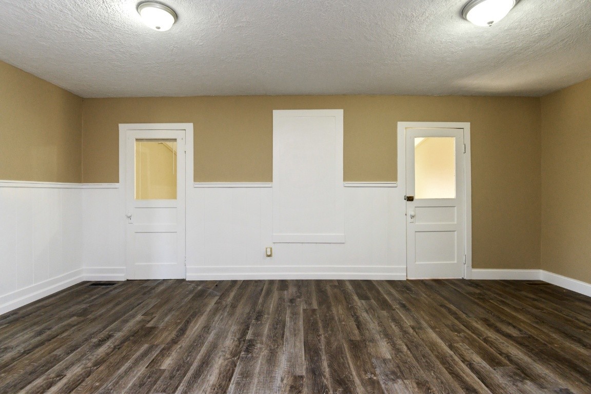 2480 Mann Road Lebanon, TN 37087 - Photo 26 of 35 an empty room with wooden floor and windows