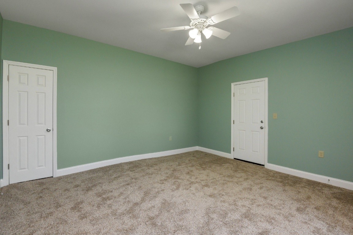 2480 Mann Road Lebanon, TN 37087 - Photo 34 of 35 an empty room with a window and a fan