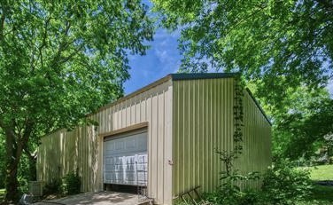2480 Mann Road Lebanon, TN 37087 - Photo 6 of 35 a view of a house with a backyard