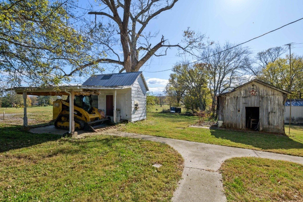 2480 Mann Road Lebanon, TN 37087 - Photo 8 of 35 a view of a house with yard and tree s