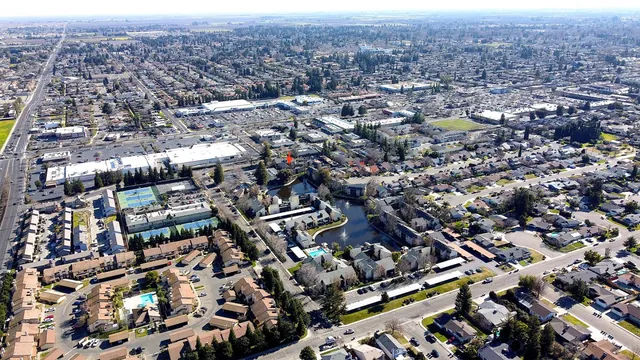 an aerial view of residential house and lake view