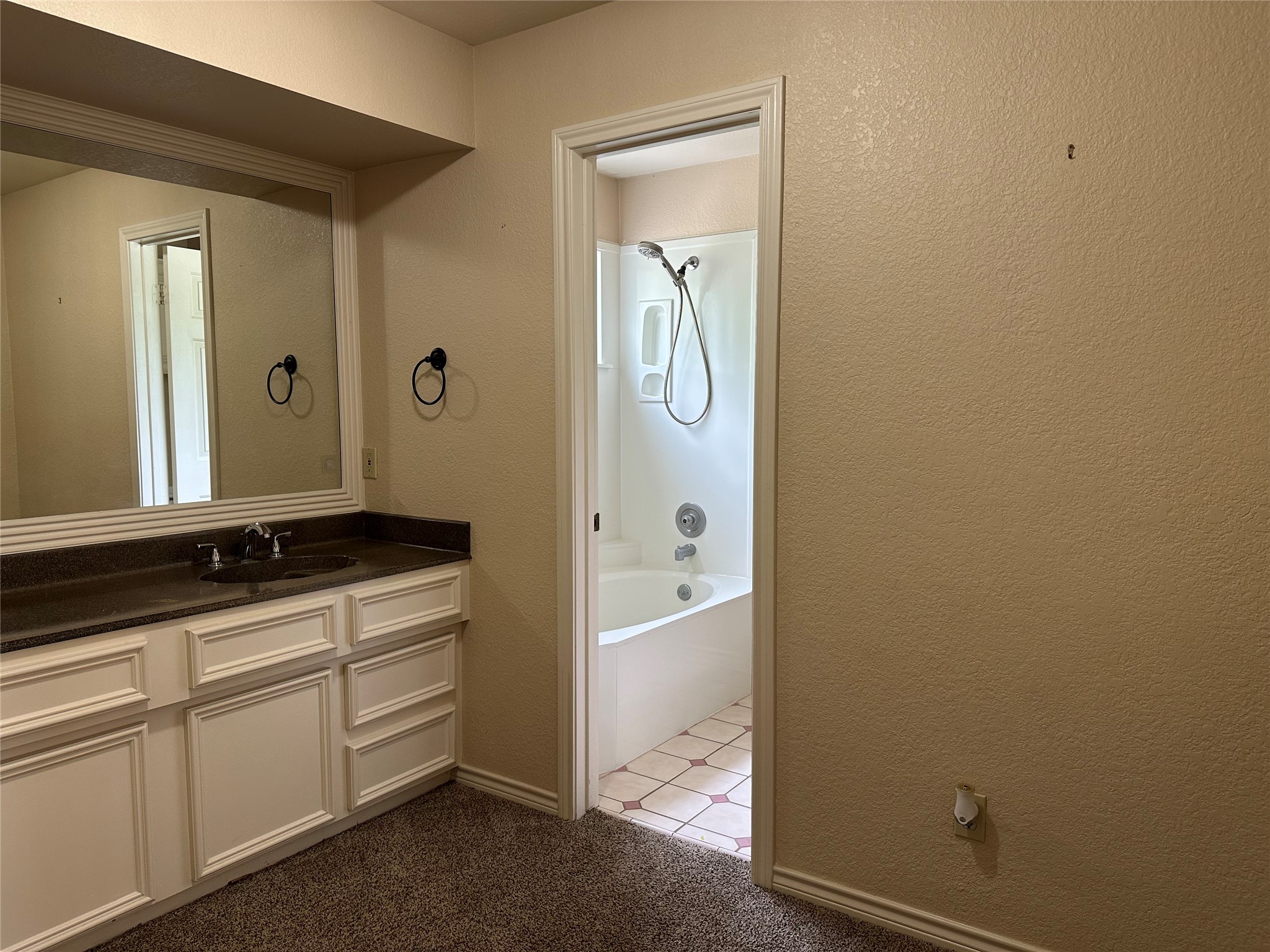 33615 Dobbin-Huffsmith Road Magnolia, TX 77354 - Photo 21 of 44 Upstairs full bathroom has a huge area with the sink and also more room for a hamper, shelves, etc.