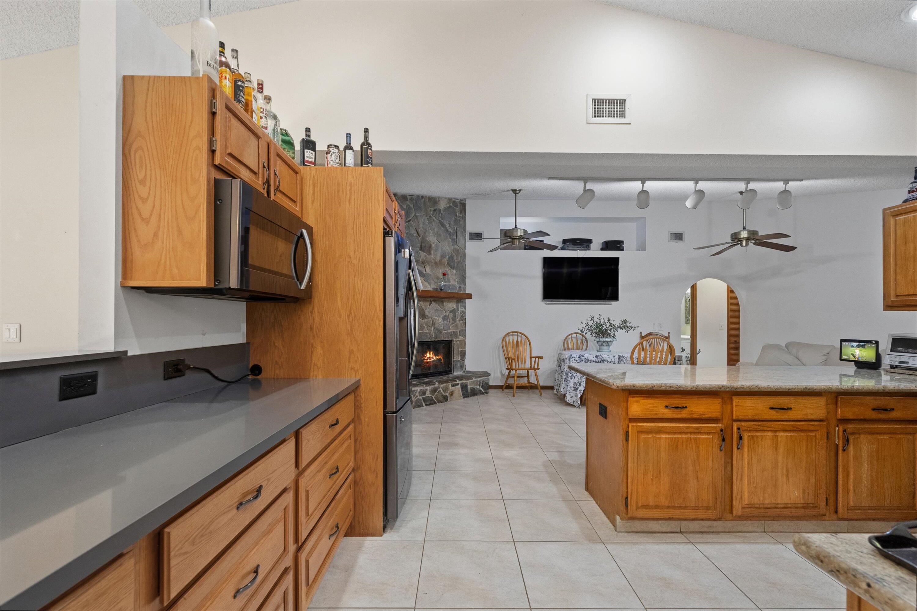 7169 154th Road North Palm Beach Gardens, FL 33418 - Photo 15 of 62 a kitchen with a sink and cabinets