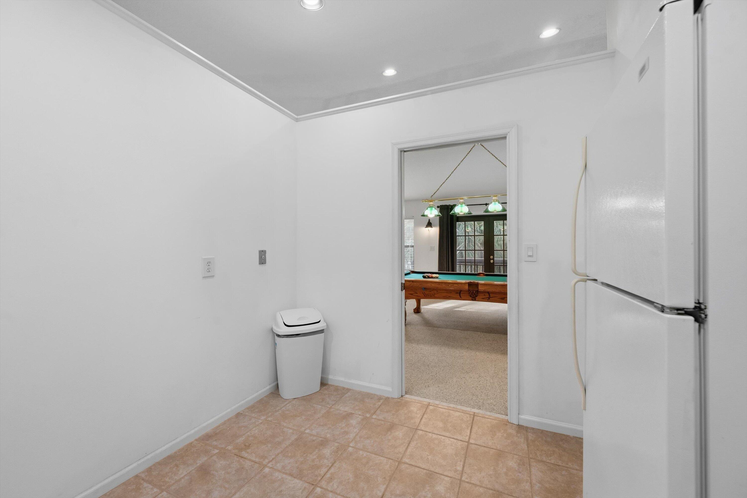 7169 154th Road North Palm Beach Gardens, FL 33418 - Photo 38 of 62 a bathroom with a toilet