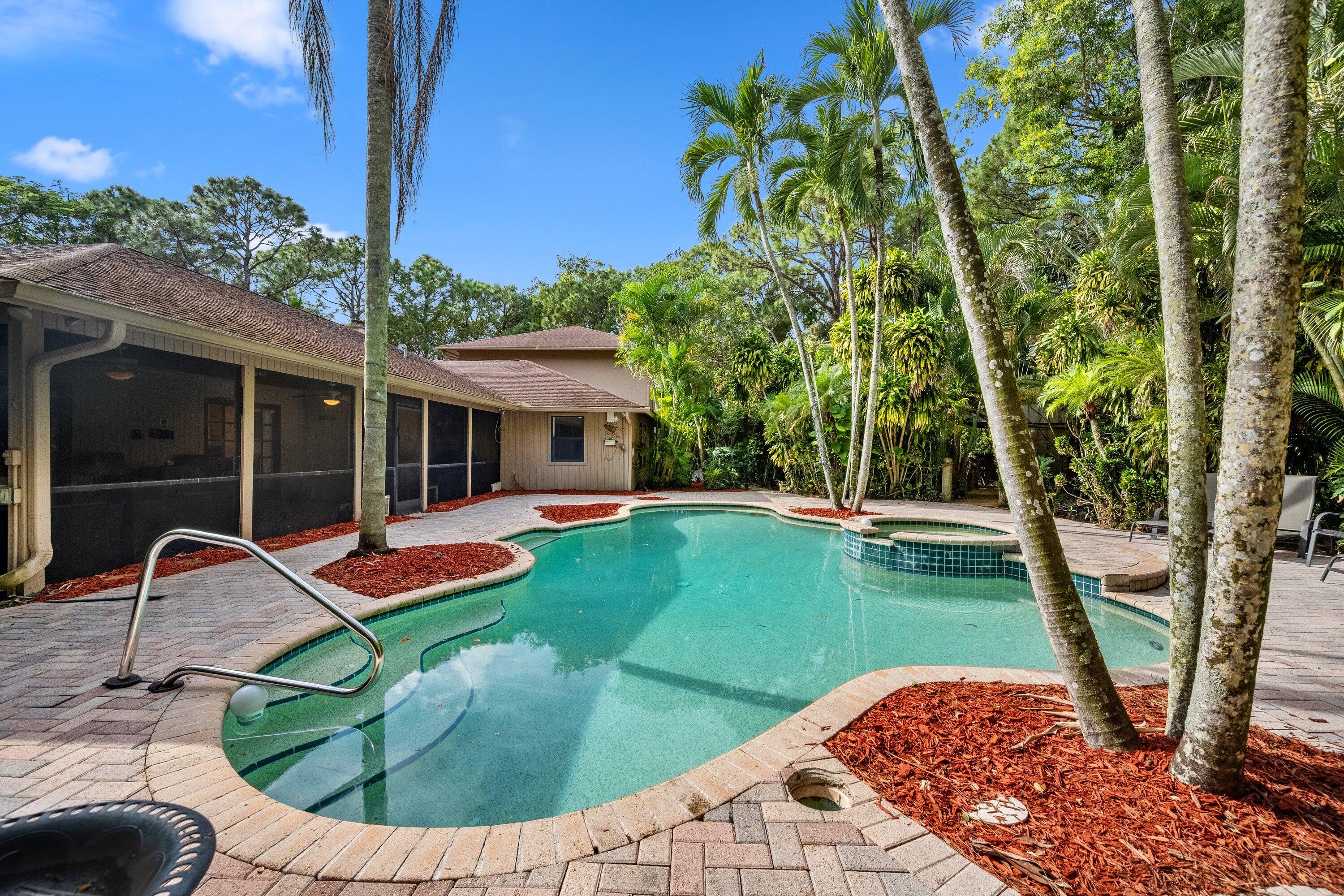 7169 154th Road North Palm Beach Gardens, FL 33418 - Photo 42 of 62 a view of outdoor space yard deck and patio