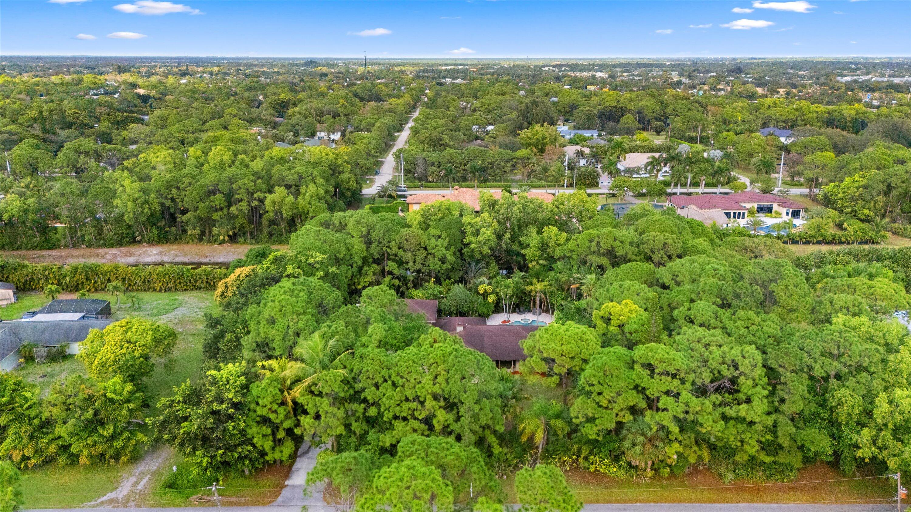 7169 154th Road North Palm Beach Gardens, FL 33418 - Photo 51 of 62 48-DJI_20251218141359_0203_D