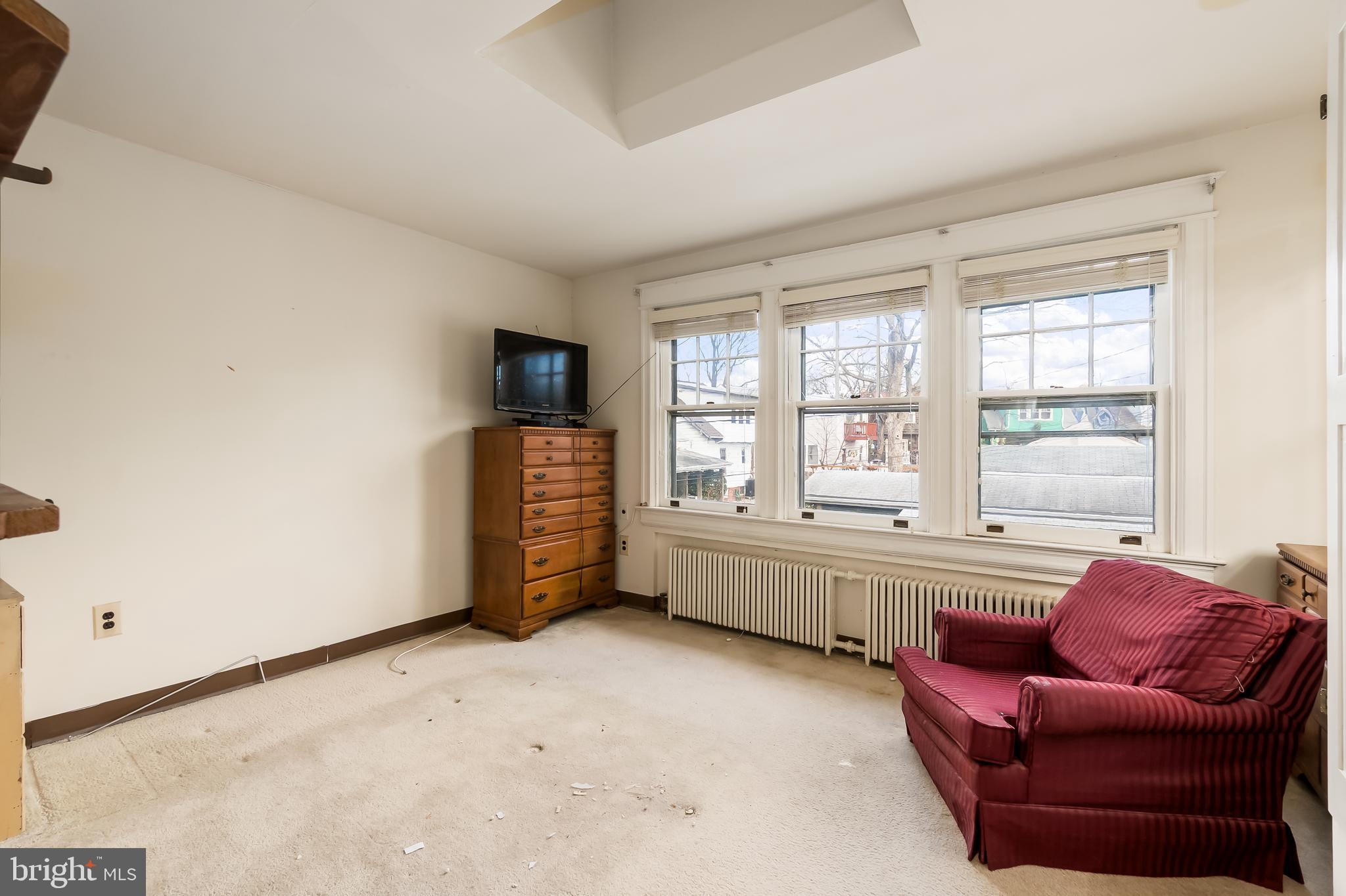 4413 7th Street Northwest Washington, DC 20011 - Photo 13 of 20 a view of livingroom with furniture and window