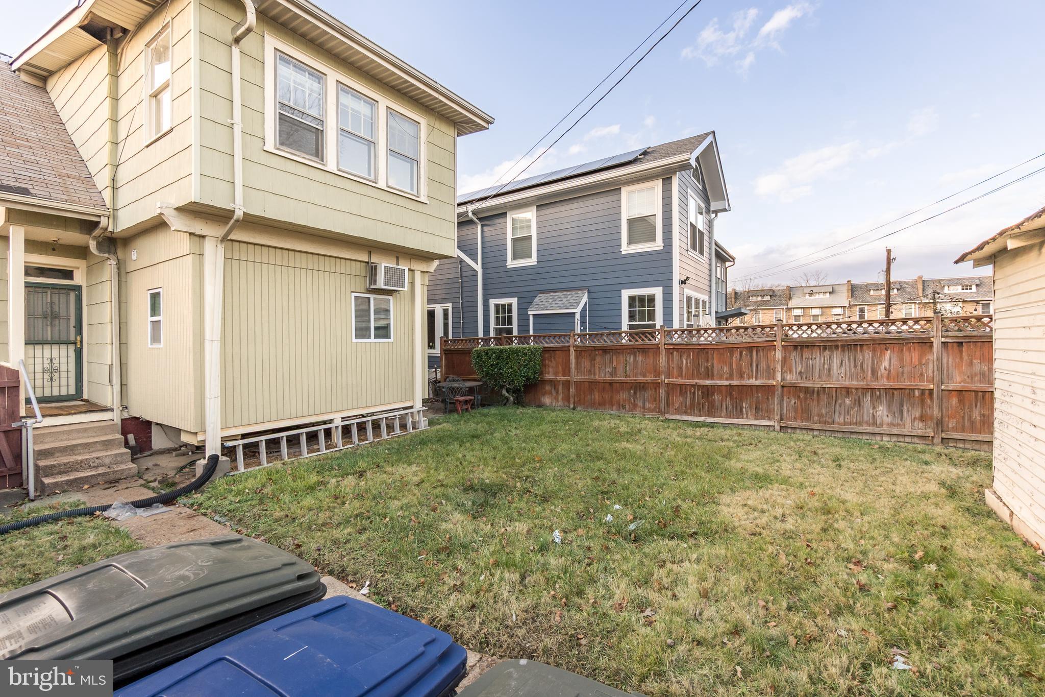 4413 7th Street Northwest Washington, DC 20011 - Photo 15 of 20 a view of a house with backyard and sitting area