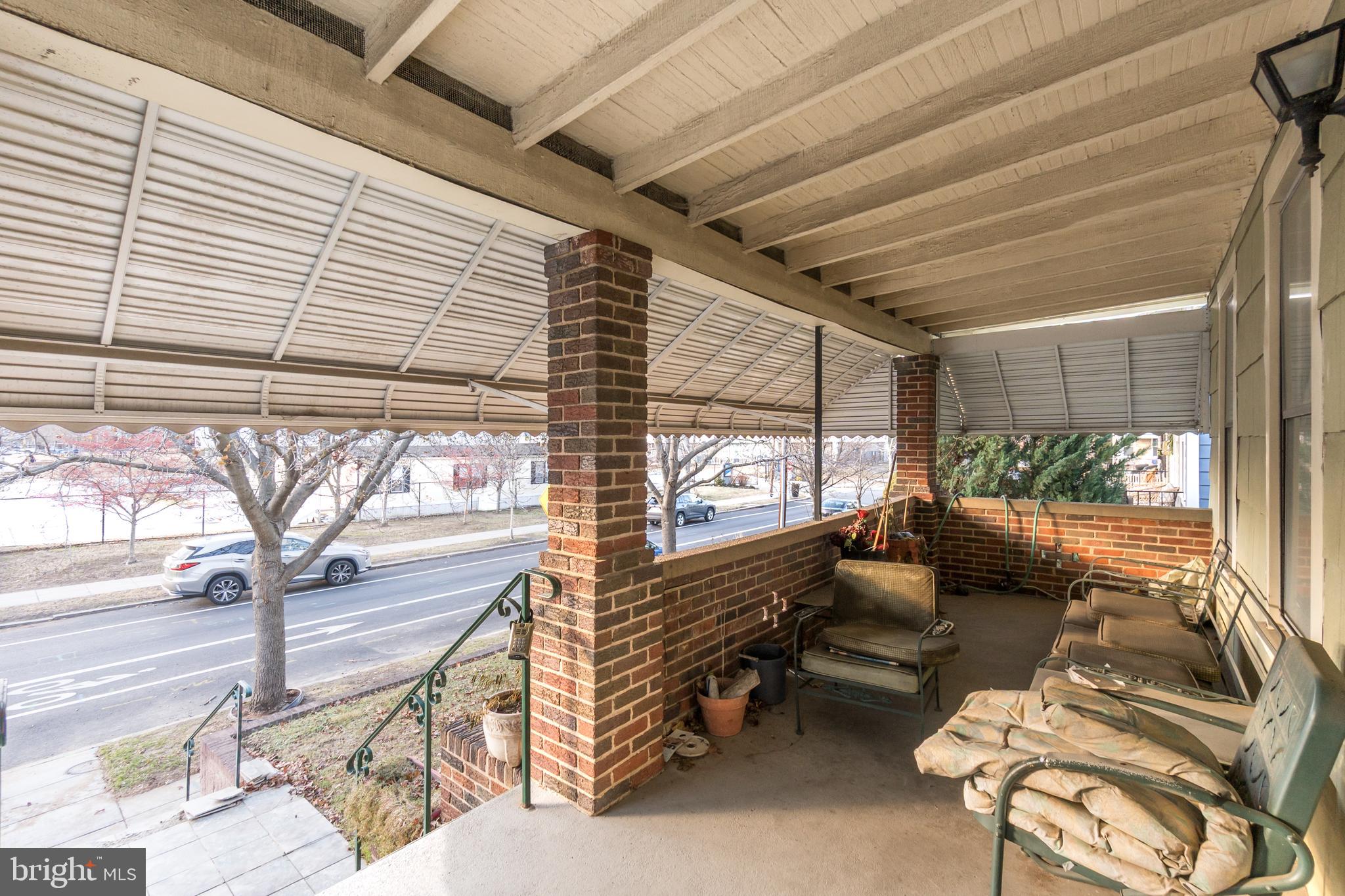 4413 7th Street Northwest Washington, DC 20011 - Photo 4 of 20 a living room with furniture and a large window