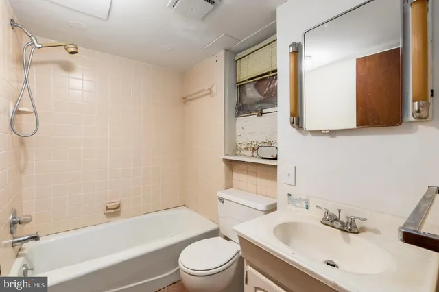 a kitchen with stainless steel appliances granite countertop a stove and a microwave