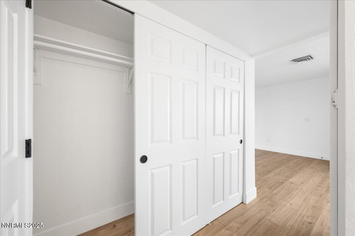 2136 Roundhouse Road Sparks, NV 89431 - Photo 12 of 26 a view of a small space with wooden floor