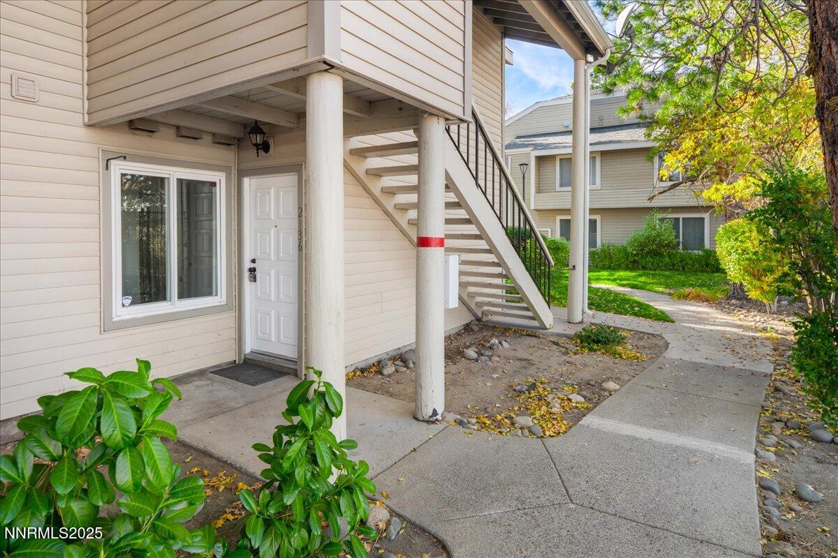2136 Roundhouse Road Sparks, NV 89431 - Photo 2 of 26 a front view of a house with a garden