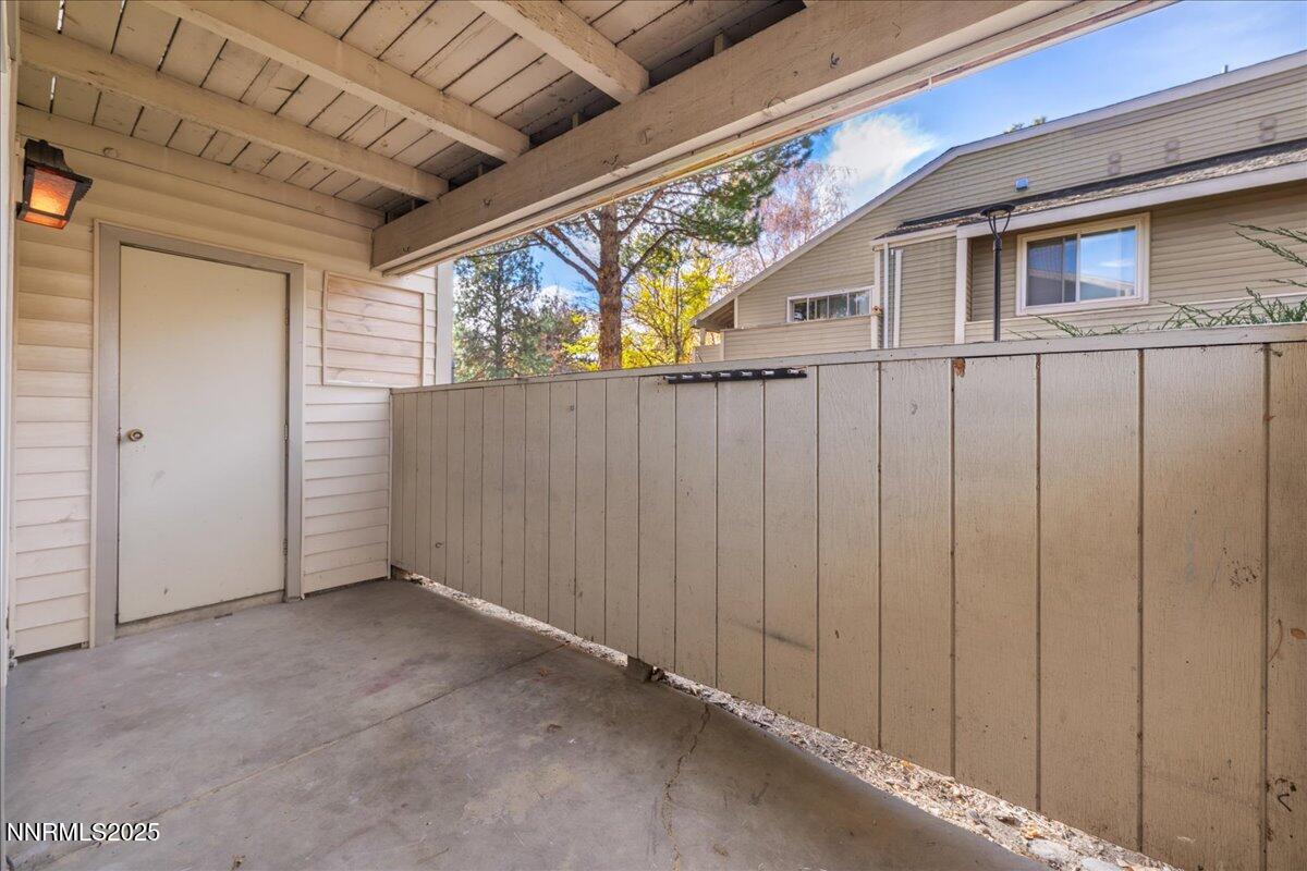 2136 Roundhouse Road Sparks, NV 89431 - Photo 21 of 26 a view of small house with wooden walls