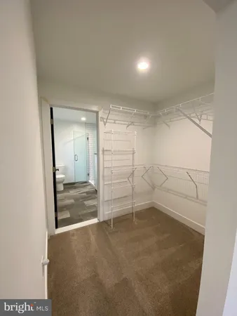 a view of a room with an empty space