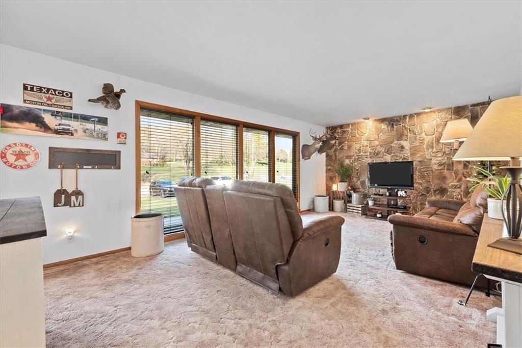 318 Holyoke Road Butler, PA 16001 - Photo 2 of 25 a living room with furniture and a flat screen tv