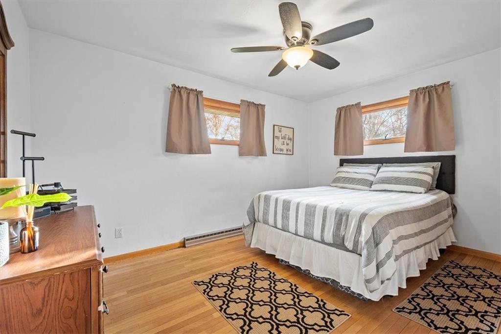 318 Holyoke Road Butler, PA 16001 - Photo 11 of 25 a bedroom with a bed and painting on the wall