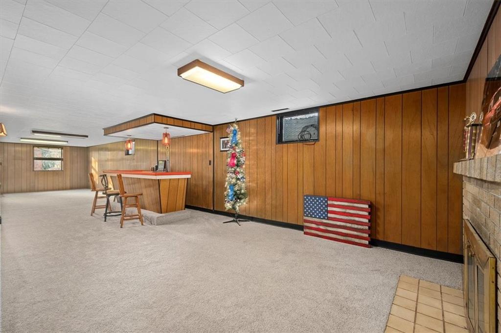 318 Holyoke Road Butler, PA 16001 - Photo 15 of 25 a bed room with a bed and a chair