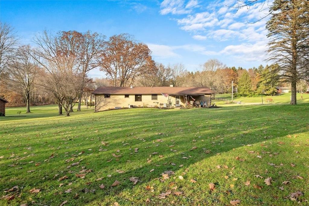 318 Holyoke Road Butler, PA 16001 - Photo 22 of 25 a view of a park with large trees