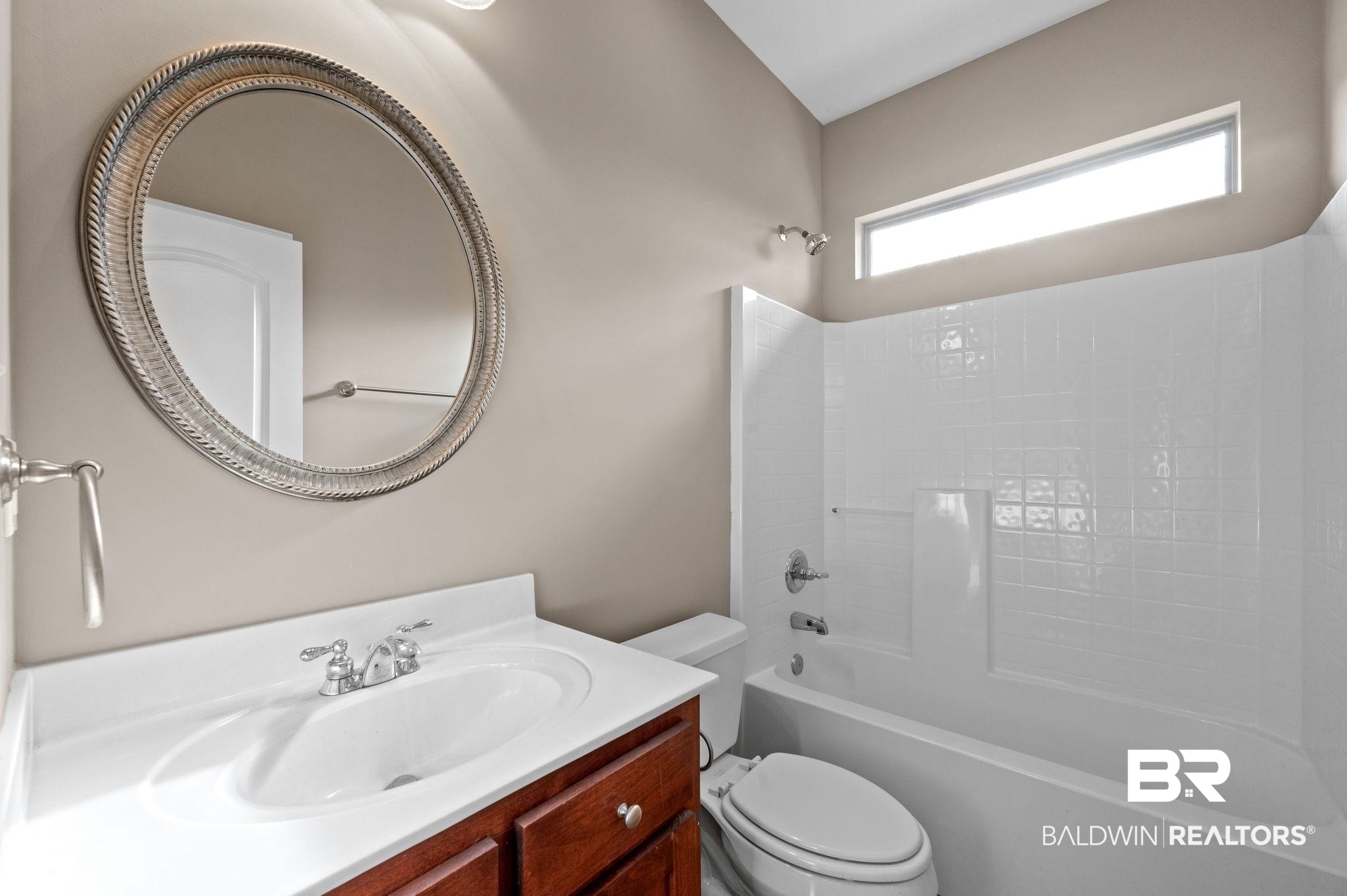 9381 Sable Court Daphne, AL 36526 - Photo 28 of 42 Full bathroom with toilet, washtub / shower combination, and vanity