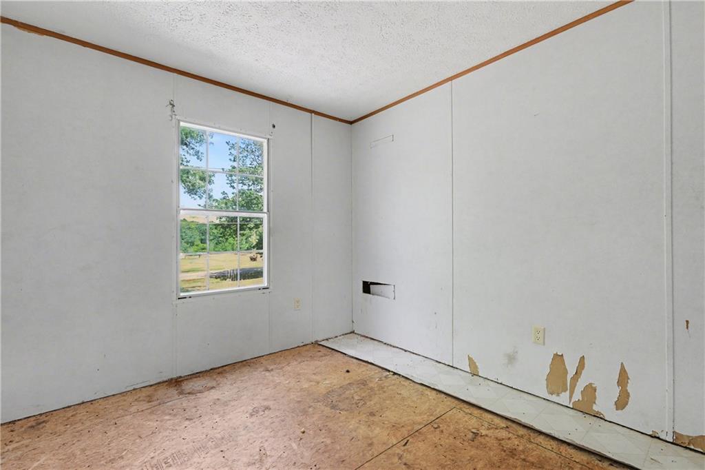 249 John Golden Road Temple, GA 30179 - Photo 35 of 45 a view of room with window and hallway