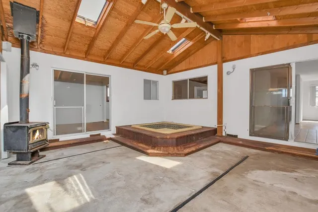 a view of a backyard of the house