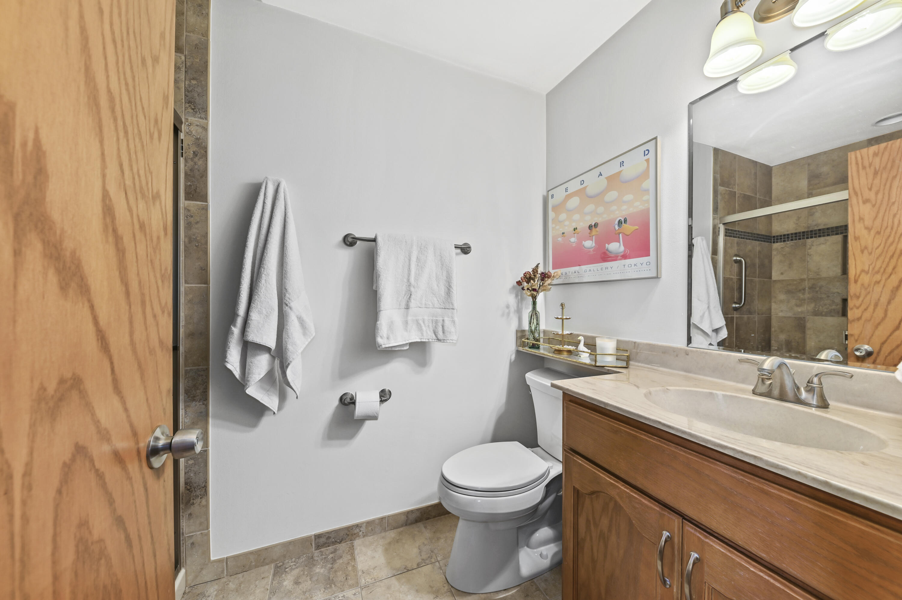 17465 Windemere Road Brookfield, WI 53045 - Photo 15 of 37 This bath is off family room next to bedroom with green wall - add a door in family room and have a private en suite bedroom